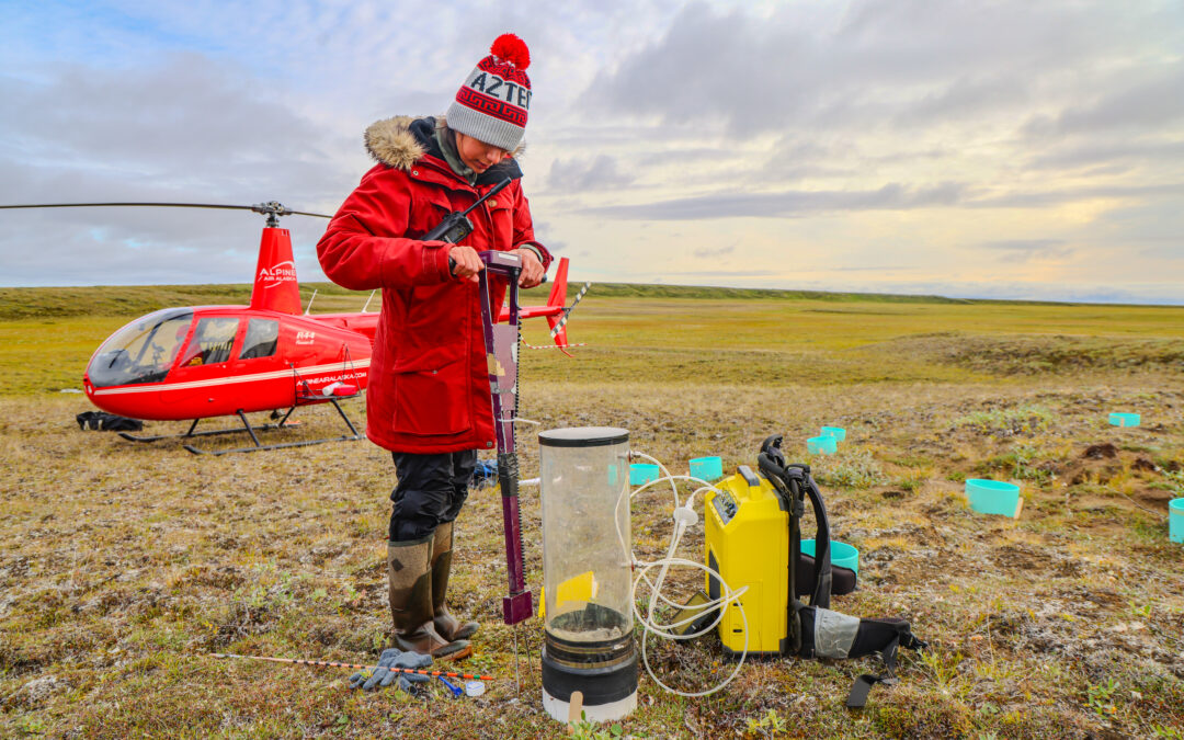 Placing a chamber that flows into a “Ghostbuster” gas analyzer, Tenorio measures differences in nitrous oxide emissions between barren and more vegetated patches of remote, thawed tundra. Back in the labs in Utqiaġvik and San Diego, she and her peers will collaboratively analyze the role that the gases from these permafrost landforms play in the ever-changing Arctic climate.